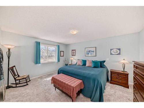 154 New Brighton Manor Se, Calgary, AB - Indoor Photo Showing Bedroom