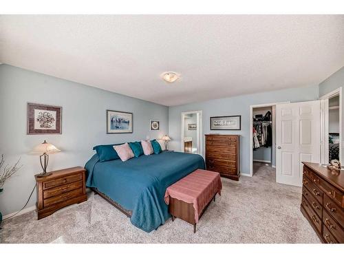 154 New Brighton Manor Se, Calgary, AB - Indoor Photo Showing Bedroom