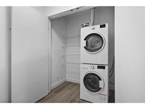 306-455 1St Avenue Ne, Calgary, AB - Indoor Photo Showing Laundry Room
