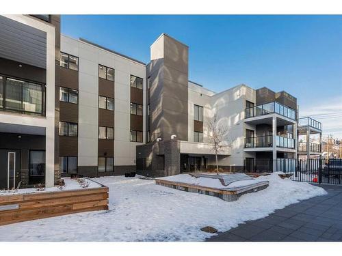 306-455 1St Avenue Ne, Calgary, AB - Outdoor With Balcony With Facade