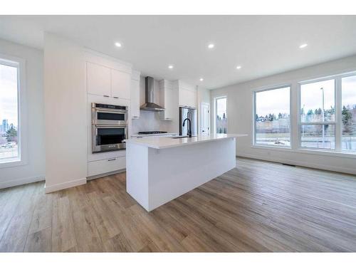 322 Sovereign Common Sw, Calgary, AB - Indoor Photo Showing Kitchen With Upgraded Kitchen