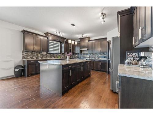 388 Kinniburgh Boulevard, Chestermere, AB - Indoor Photo Showing Kitchen With Upgraded Kitchen