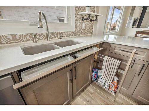 16 Macewan Place, Carstairs, AB - Indoor Photo Showing Kitchen With Double Sink