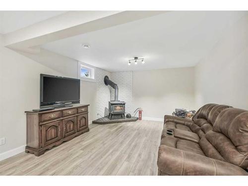 16 Macewan Place, Carstairs, AB - Indoor With Fireplace