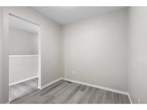 23 Kinlea Common Nw, Calgary, AB - Indoor Photo Showing Other Room