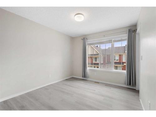 23 Kinlea Common Nw, Calgary, AB - Indoor Photo Showing Other Room