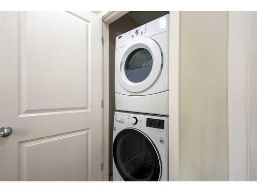 23 Kinlea Common Nw, Calgary, AB - Indoor Photo Showing Laundry Room
