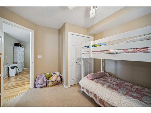 101-6315 Ranchview Drive Nw, Calgary, AB - Indoor Photo Showing Bedroom
