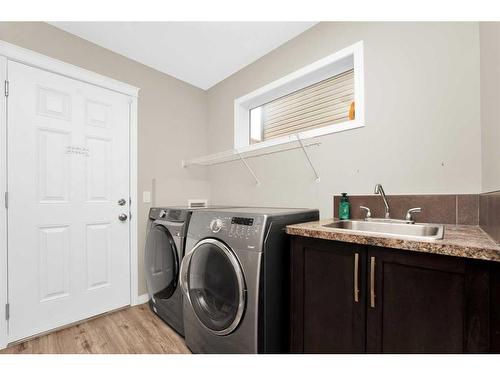 29 Panora View Nw, Calgary, AB - Indoor Photo Showing Laundry Room
