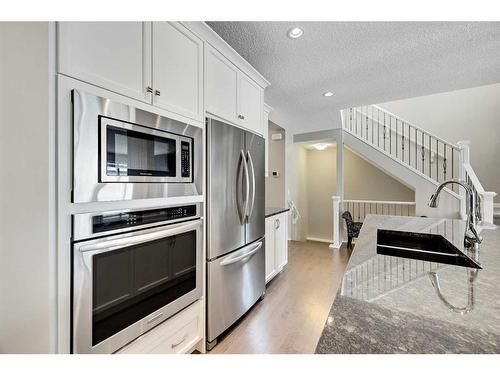 54 Auburn Meadows Court Se, Calgary, AB - Indoor Photo Showing Kitchen With Stainless Steel Kitchen With Double Sink