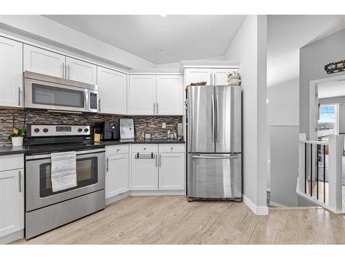 43 Hawkridge Boulevard, Penhold, AB - Indoor Photo Showing Kitchen With Stainless Steel Kitchen