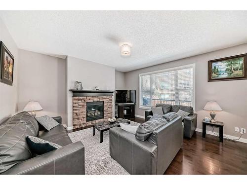 18 Rockford Road Nw, Calgary, AB - Indoor Photo Showing Living Room With Fireplace