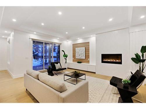419 Patterson Boulevard Sw, Calgary, AB - Indoor Photo Showing Living Room With Fireplace