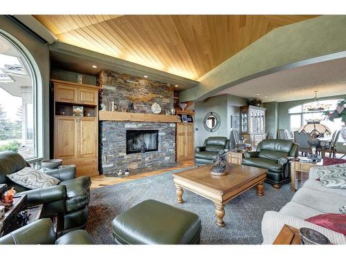 10-290254 96 Street West, Rural Foothills County, AB - Indoor Photo Showing Living Room With Fireplace