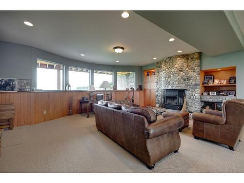 10-290254 96 Street West, Rural Foothills County, AB - Indoor Photo Showing Living Room With Fireplace