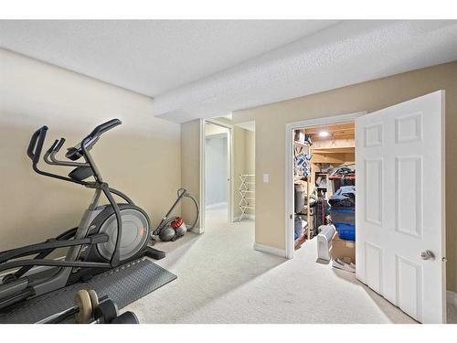 150 Prestwick Crescent Se, Calgary, AB - Indoor Photo Showing Gym Room