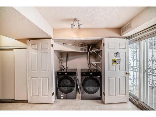 420 Hawkstone Manor Nw, Calgary, AB - Indoor Photo Showing Laundry Room
