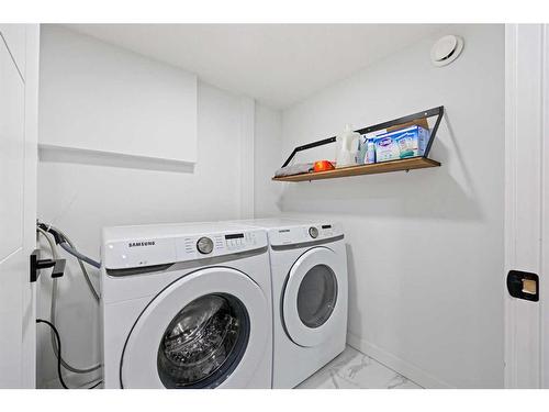 93 Fielding Drive Se, Calgary, AB - Indoor Photo Showing Laundry Room