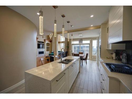 36 Coulee Park Sw, Calgary, AB - Indoor Photo Showing Kitchen With Double Sink With Upgraded Kitchen
