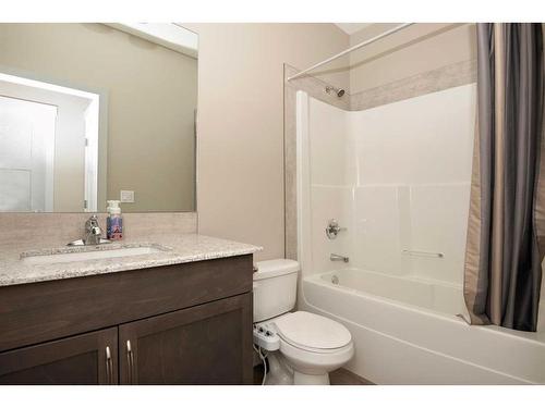 633 Country Meadows Close, Diamond Valley, AB - Indoor Photo Showing Bathroom