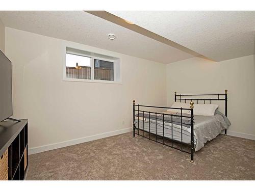633 Country Meadows Close, Diamond Valley, AB - Indoor Photo Showing Bedroom