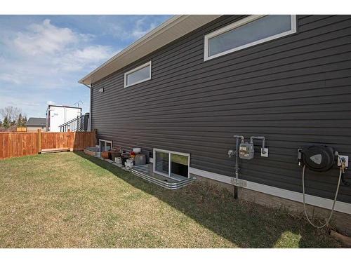 633 Country Meadows Close, Diamond Valley, AB - Outdoor With Exterior