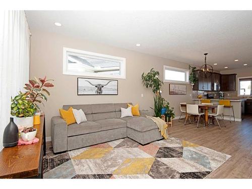 633 Country Meadows Close, Diamond Valley, AB - Indoor Photo Showing Living Room