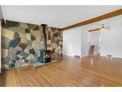710 68 Avenue Sw, Calgary, AB - Indoor With Fireplace