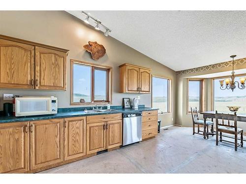 200-274128 320 Street East, Rural Foothills County, AB - Indoor Photo Showing Dining Room