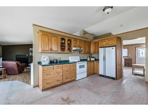 200-274128 320 Street East, Rural Foothills County, AB - Indoor Photo Showing Kitchen