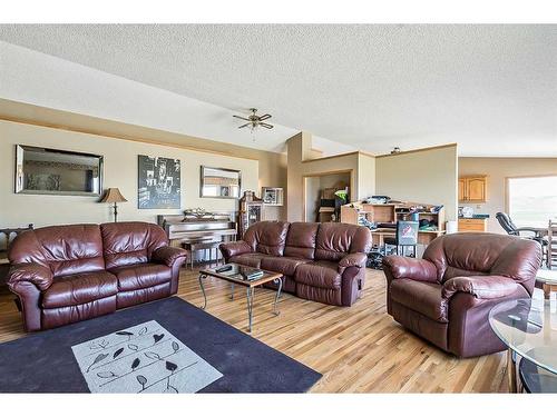 200-274128 320 Street East, Rural Foothills County, AB - Indoor Photo Showing Living Room