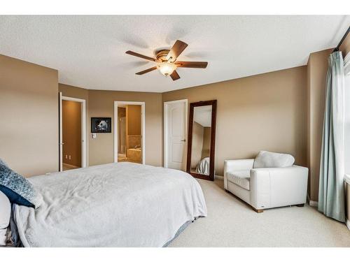295 Sunset Point, Cochrane, AB - Indoor Photo Showing Bedroom