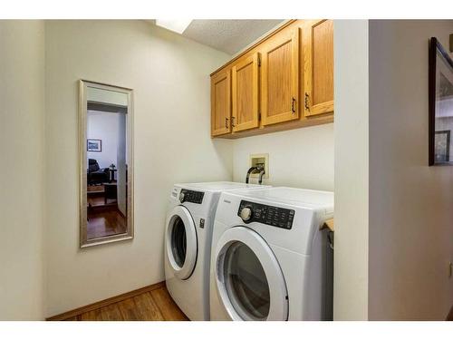 130 Hawkstone Drive Nw, Calgary, AB - Indoor Photo Showing Laundry Room