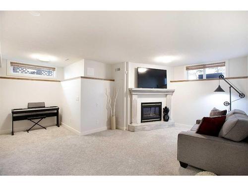 196 Mt Douglas Point Se, Calgary, AB - Indoor With Fireplace