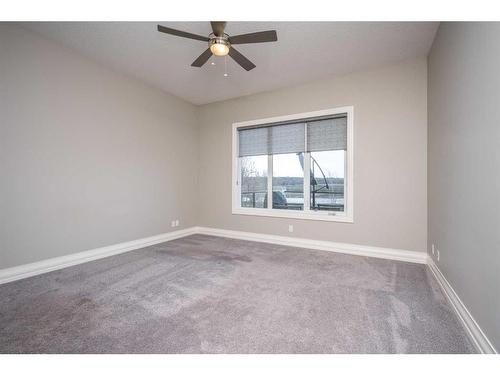 22 Cranbrook Landing Se, Calgary, AB - Indoor Photo Showing Other Room