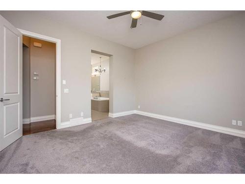 22 Cranbrook Landing Se, Calgary, AB - Indoor Photo Showing Other Room