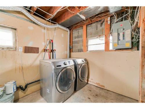 7428 26A Street Se, Calgary, AB - Indoor Photo Showing Laundry Room