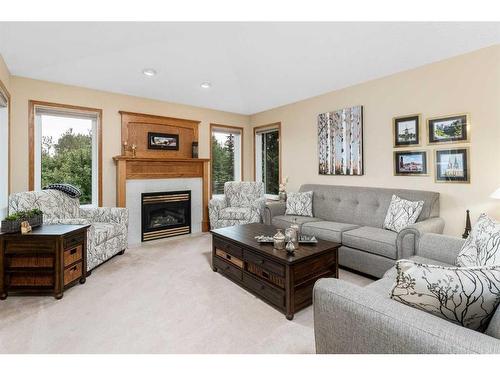 15-33106 Range Road 12, Rural Mountain View County, AB - Indoor Photo Showing Living Room With Fireplace