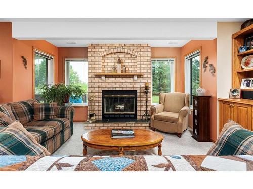 15-33106 Range Road 12, Rural Mountain View County, AB - Indoor Photo Showing Living Room With Fireplace