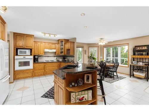 15-33106 Range Road 12, Rural Mountain View County, AB - Indoor Photo Showing Kitchen With Double Sink