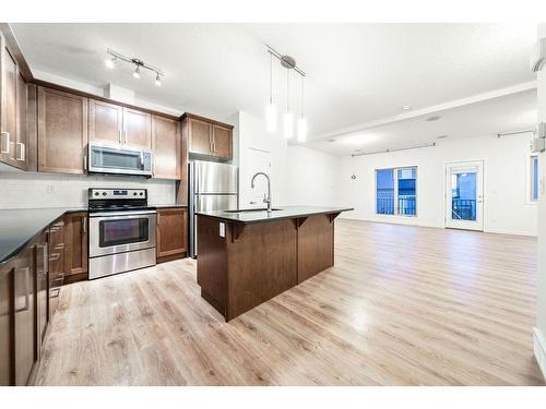 412 Legacy Point Se, Calgary, AB - Indoor Photo Showing Kitchen With Stainless Steel Kitchen With Upgraded Kitchen
