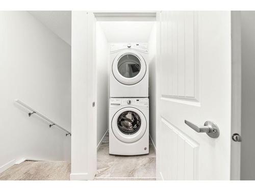 412 Legacy Point Se, Calgary, AB - Indoor Photo Showing Laundry Room