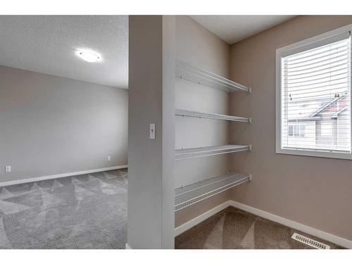 652 Copperpond Boulevard Se, Calgary, AB - Indoor With Storage