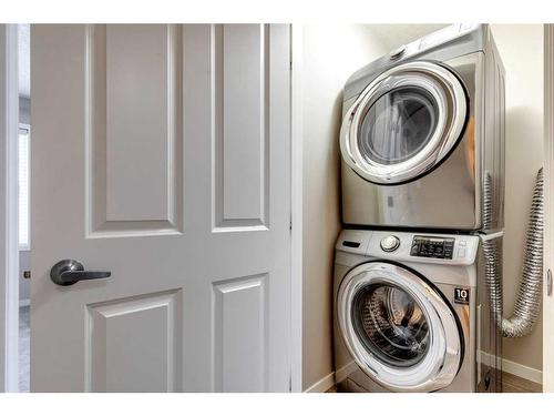 652 Copperpond Boulevard Se, Calgary, AB - Indoor Photo Showing Laundry Room