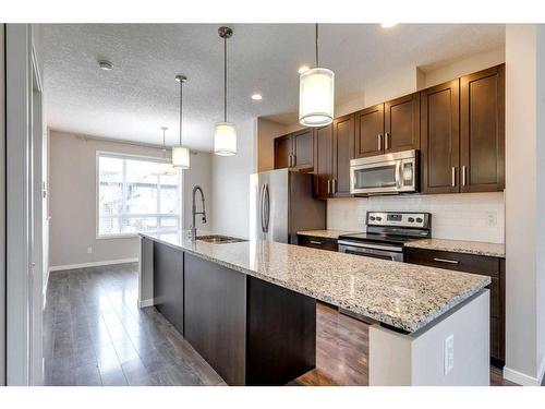 652 Copperpond Boulevard Se, Calgary, AB - Indoor Photo Showing Kitchen With Stainless Steel Kitchen With Upgraded Kitchen