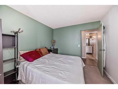 1410-4944 Dalton Drive Nw, Calgary, AB - Indoor Photo Showing Bedroom