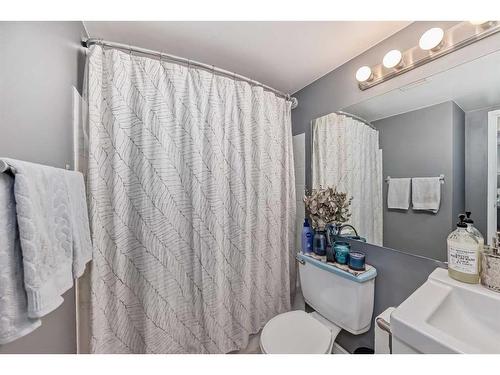 1410-4944 Dalton Drive Nw, Calgary, AB - Indoor Photo Showing Bathroom