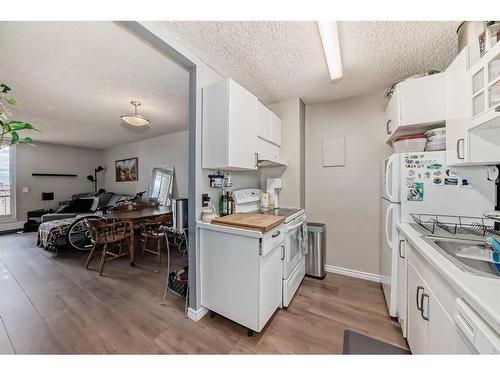 1410-4944 Dalton Drive Nw, Calgary, AB - Indoor Photo Showing Kitchen