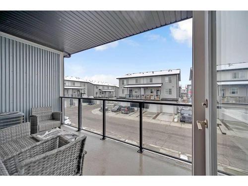 201-135 Redstone Walk Ne, Calgary, AB - Outdoor With Balcony With Exterior