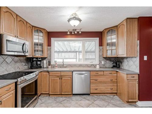 7136 Hunterwood Road Nw, Calgary, AB - Indoor Photo Showing Kitchen With Stainless Steel Kitchen